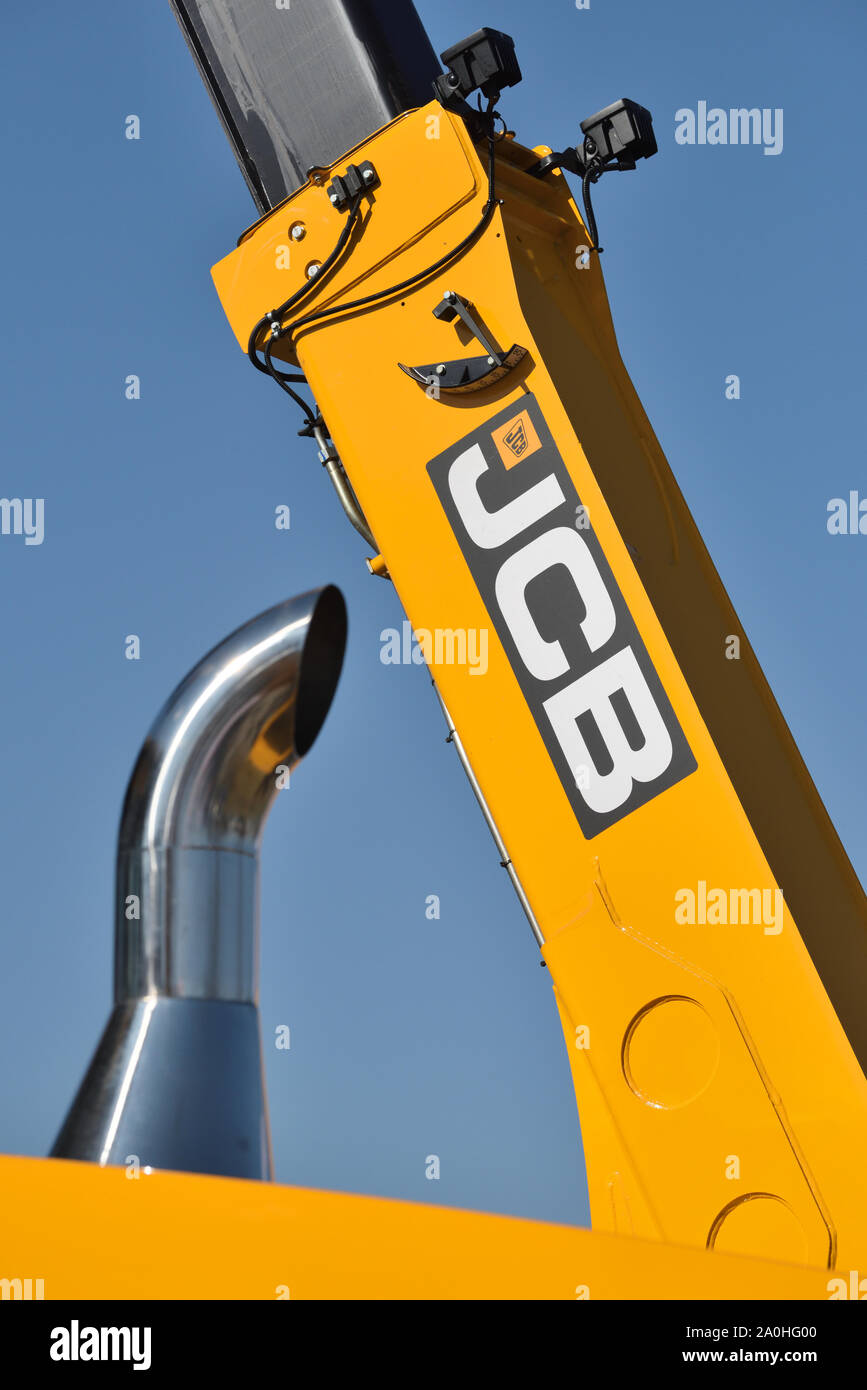 Kaunas, Lithuania - April 04: JCB heavy duty equipment vehicle and logo in Kaunas on April 04, 2019.  JCB corporation is manufacturing equipment for c Stock Photo