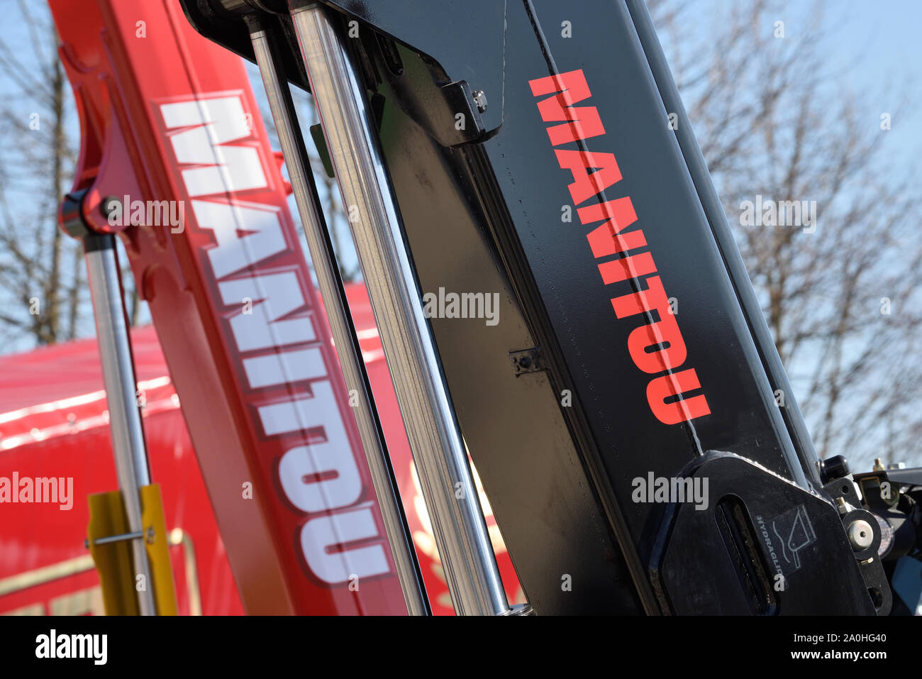 Kaunas, Lithuania - April 04: Manitou forklift tractor detail and logo in Kaunas on April 04, 2019. Manitou is a firm that makes fork lifts, cherry pi Stock Photo