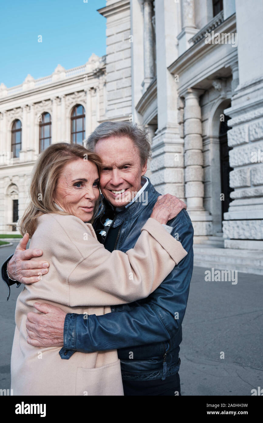 19 September 2019, Austria, Wien: Singer Peter Kraus with his wife Ingrid  stand in front of the Burgtheater in the Innere Stadt (1st district). The  married couple Kraus celebrates its golden wedding