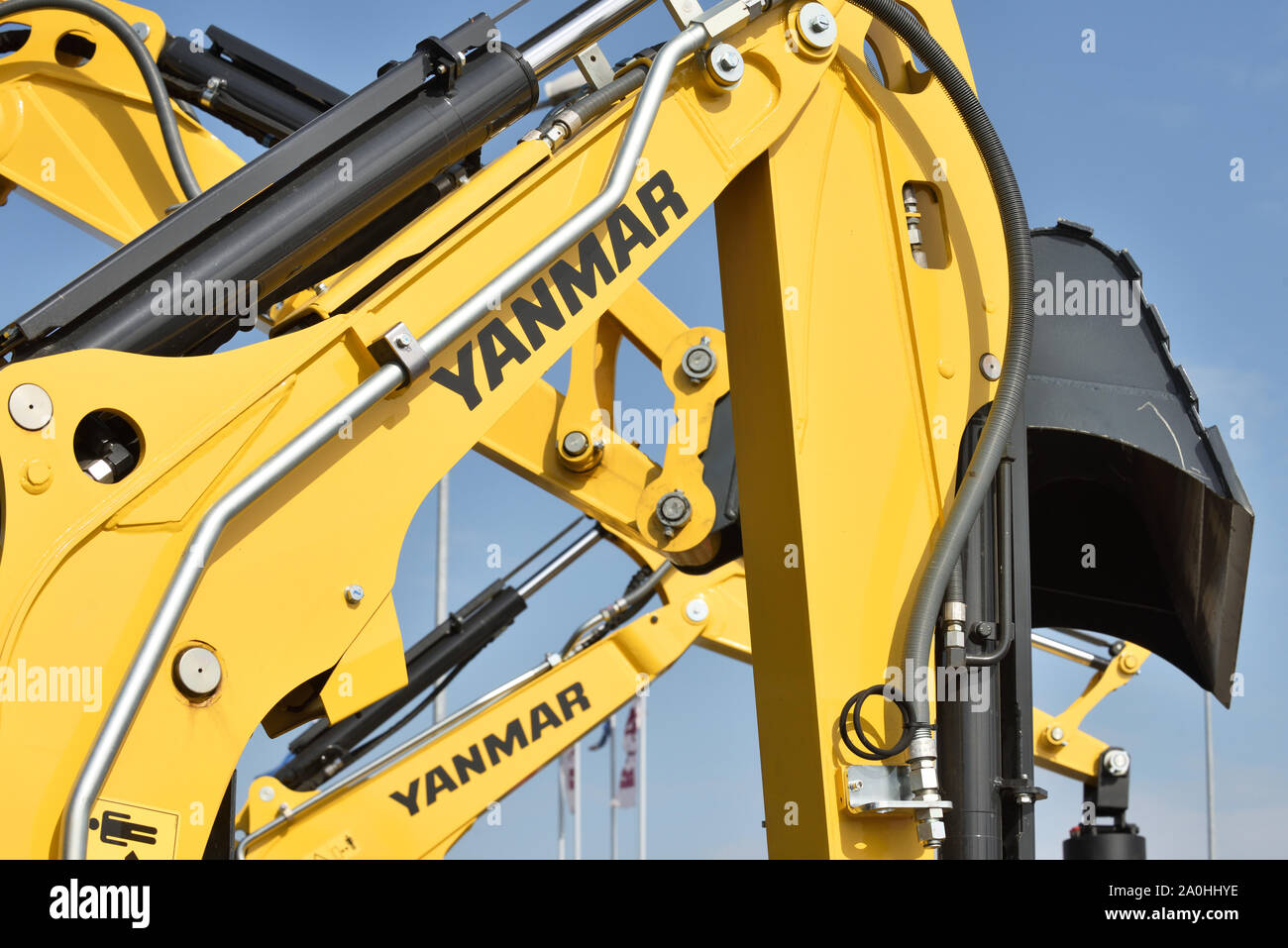 Vilnius, Lithuania - April 25: Yanmar excavator and logo on April 25, 2019 in Vilnius Lithuania. Yanmar is a Japanese company involved in the manufact Stock Photo