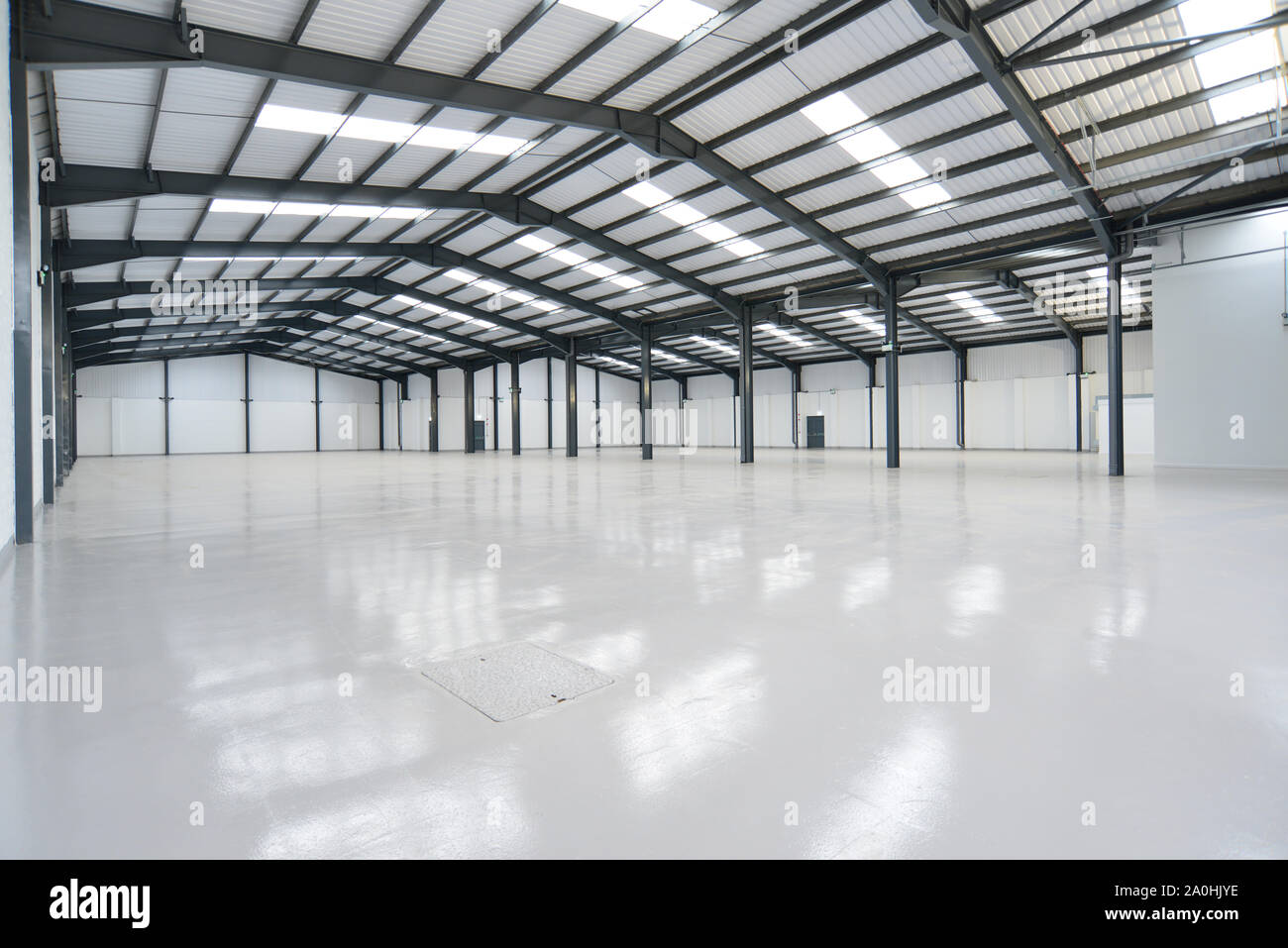 View of a large empty warehouse unit Stock Photo