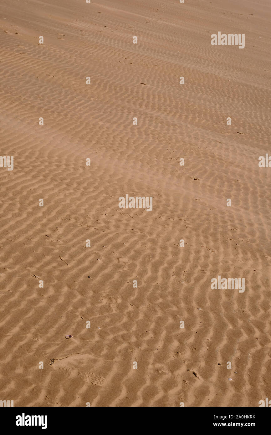 a view of rippled beach sand close up without a horizon Stock Photo