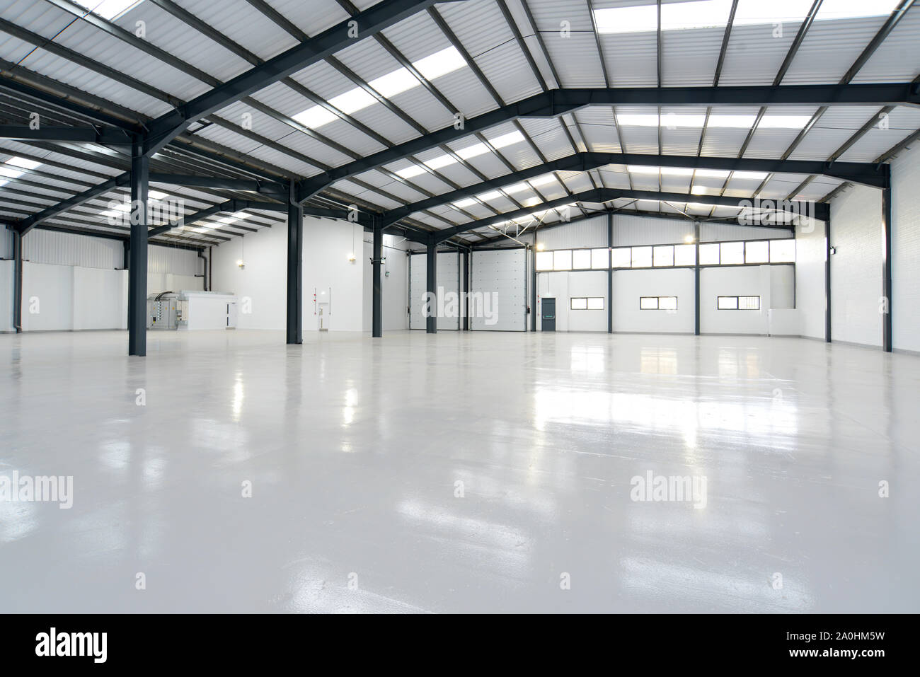 empty warehouse unit with shiny floor Stock Photo