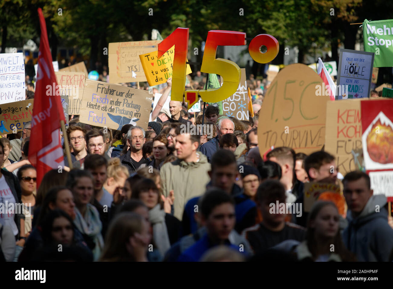 Bonn, Germany. 20th Sep, 2019. Several thousand people demonstrate at the Friday for Future demonstration for more climate protection. Demonstrators are holding up a large 1.5. The demonstrators follow the call of the movement Fridays for Future and want to fight for more climate protection. They want to support the calls for strikes and protests all over the world. Credit: Henning Kaiser/dpa/Alamy Live News Stock Photo