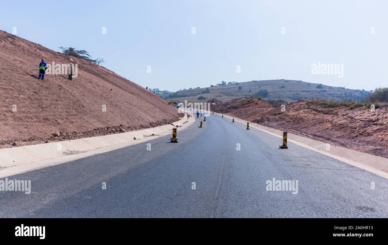 Road highway construction warning signs barriers traffic detour routes