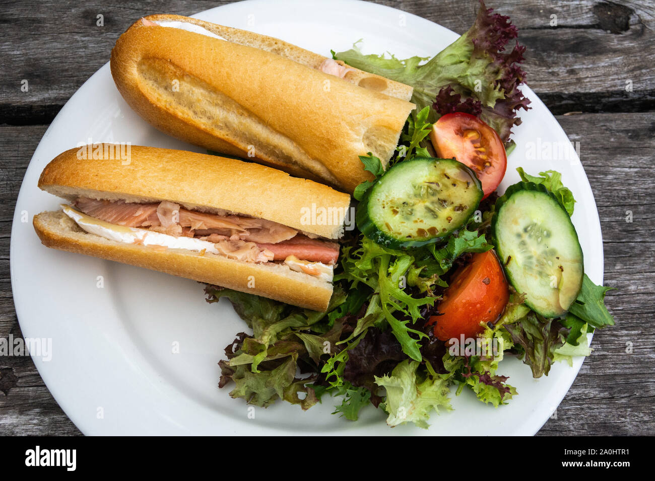 Fish and cheese sandwich with salad, in Australia. Stock Photo