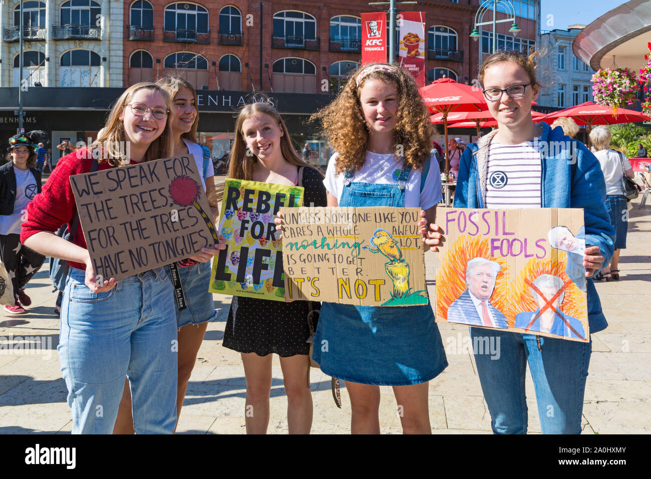 Bournemouth, Dorset UK. 20th September 2019. Protesters, young and old, gather in Bournemouth Square on a hot sunny day to protest against climate change and demand action against climate breakdown from government and businesses to do more. BCP (Bournemouth, Christchurch, Poole) Council have reportedly been threatened with legal action and could be taken to court until they produce proper timely climate change plans. we speak for the trees for the trees have no tongues, rebel for life, fossil fools, unless someone like you cares a whole awful lot nothi   Credit: Carolyn Jenkins/Alamy Live News Stock Photo