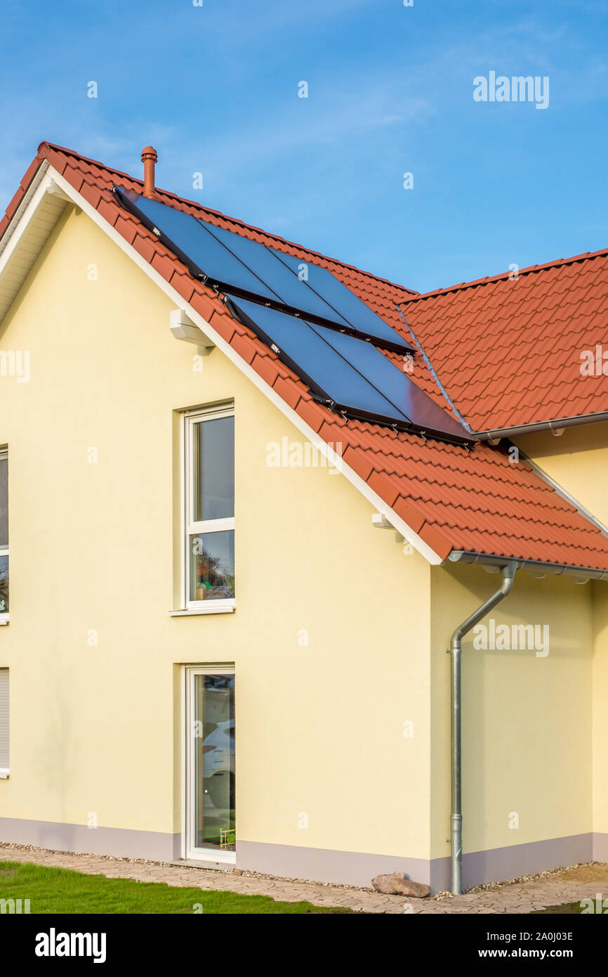 House with solar thermal Stock Photo