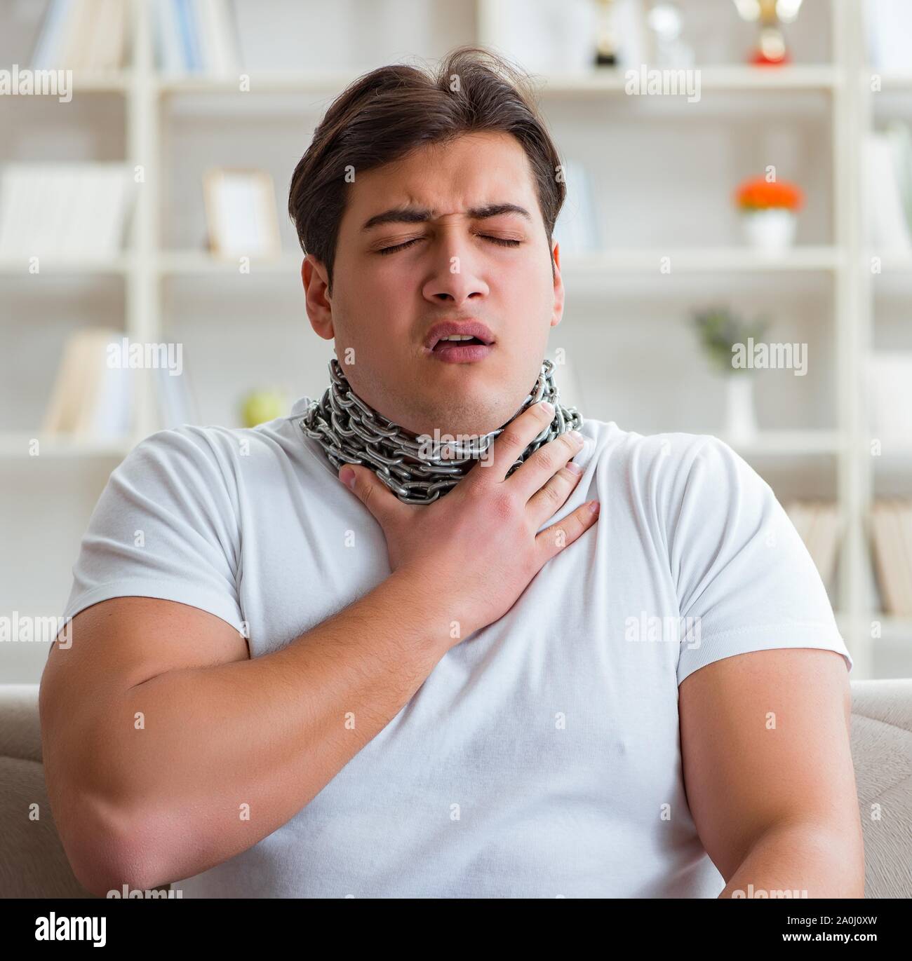 The young man suffering from sore throat Stock Photo Alamy