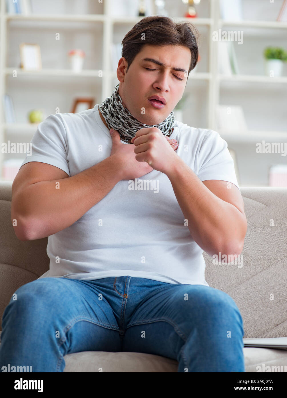 The young man suffering from sore throat Stock Photo Alamy