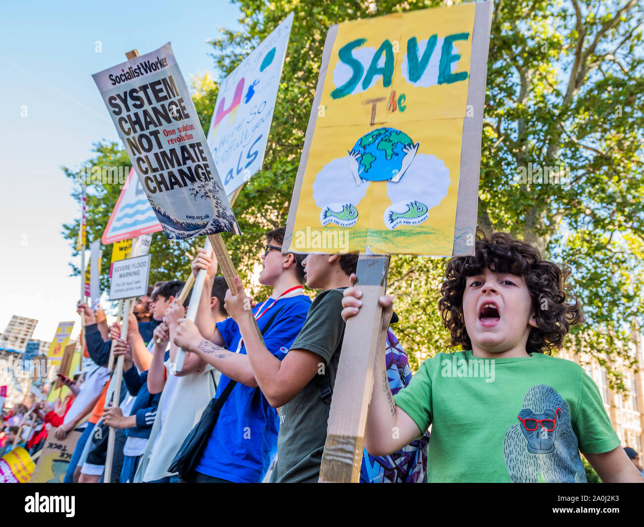 London, UK. 20th Sep, 2019. A general strike for Climate Justice, attended by school children, students and adults, is organised by Extinction Rebellion, Greenpeace, Save the Earth and other groups campaigning for the environment. They are again highlighting the climate emergency, with time running out to save the planet from a climate disaster. This is part of the ongoing ER and other protests to demand action by the UK Government on the 'climate crisis'. The action is part of an international co-ordinated protest. Credit: Guy Bell/Alamy Live News Stock Photo