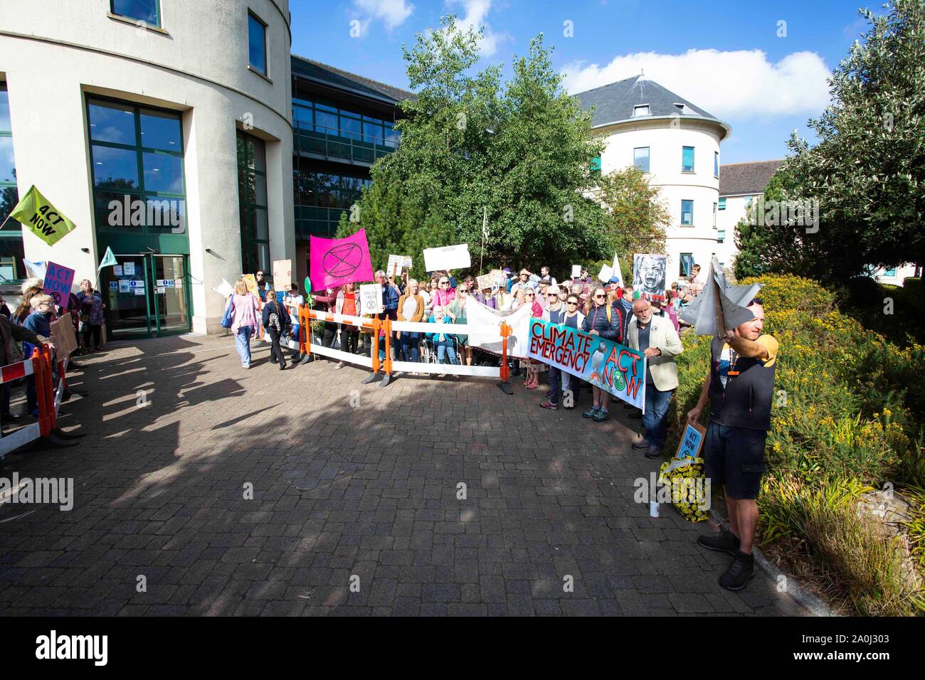 Haverfordwest, Wales, UK. 20 September 2019.  Climate protesters and activists demonstrate in front of County Hall in Haverfordwest as part of the global protest in support of action on climate change.  Credit: Gruffydd Ll. Credit: Gruffydd Thomas/Alamy Live News Stock Photo
