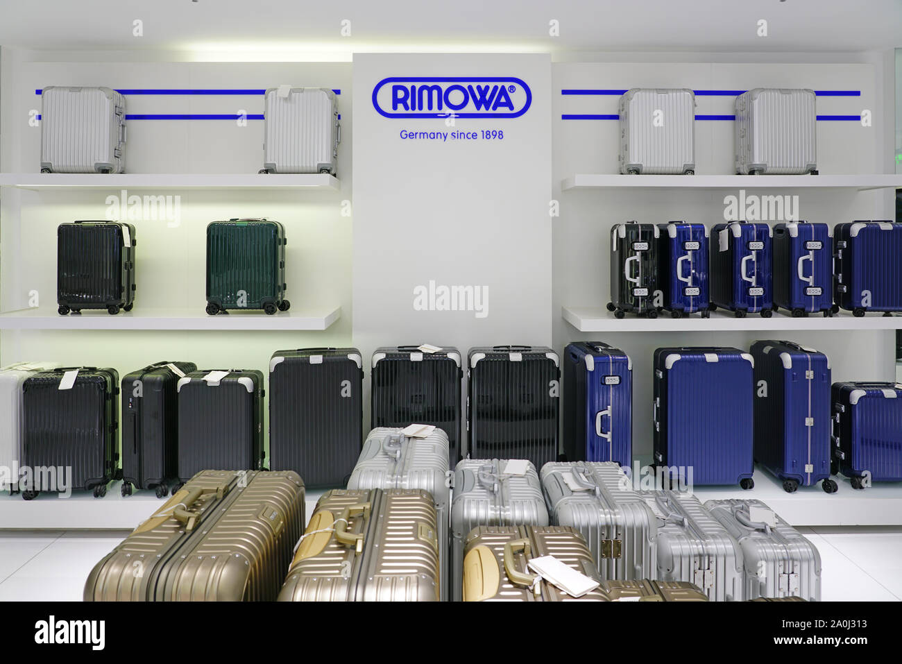 XIAMEN, CHINA -16 JUN 2019- Display of colorful metal suitcases in a Rimowa  store. Rimowa is a German company known for its sturdy aluminum and polyca  Stock Photo - Alamy