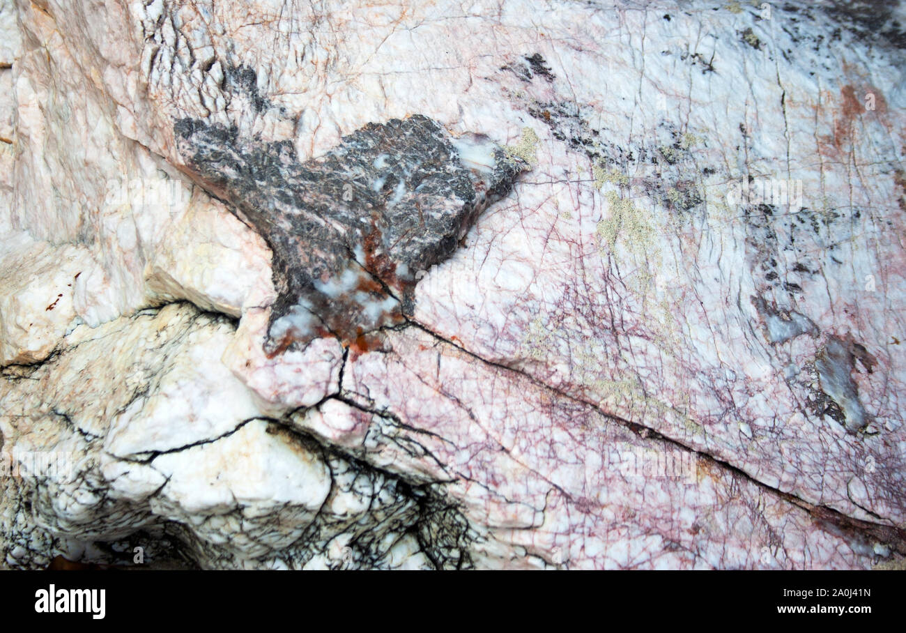 Textured stone with fissures abstract background Stock Photo