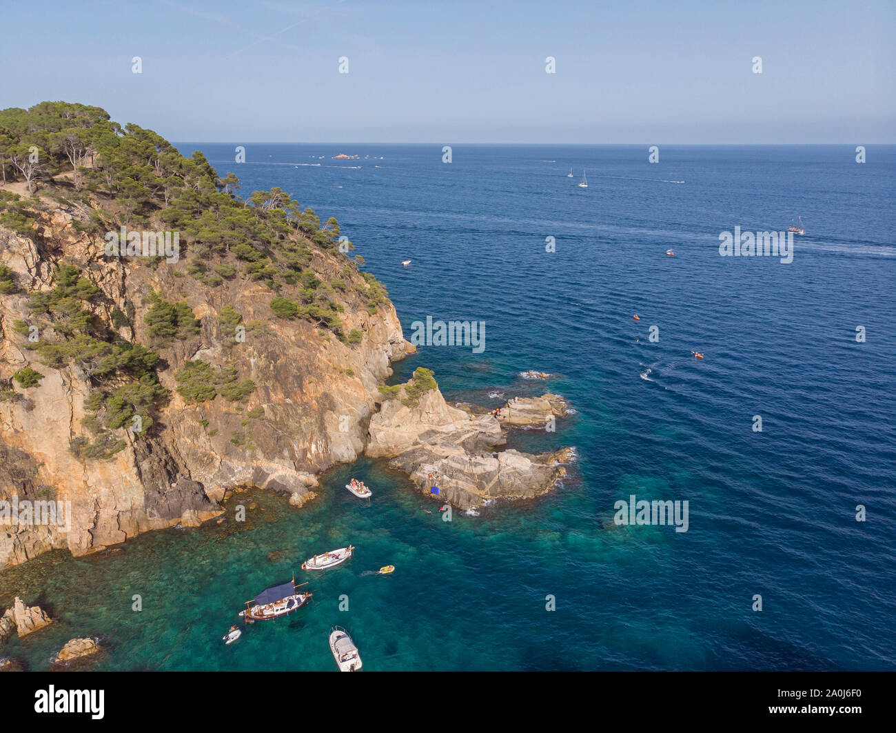 Coastal aerial view of a Spanish cove with boats Stock Photo Alamy