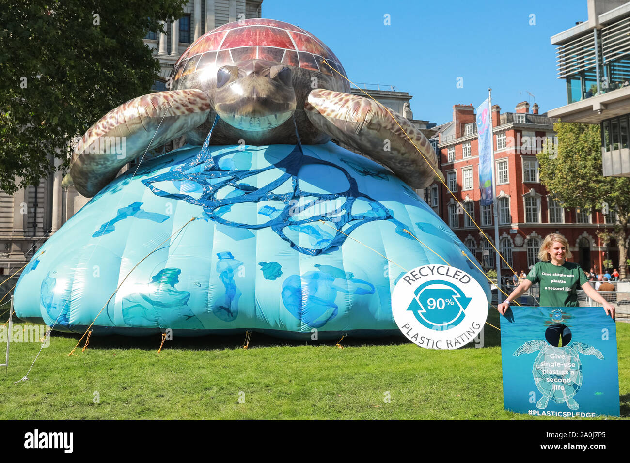 Westminster, London, UK, 20th Sep 2019. The 'Plastic Pledge' Campaign have taken a giant inflatable sea-turtle on the ocean to Westminster to highlight problems with single use plastics. Tens of thousands of children, young people and adults protest for climate action and against the causes of climate change in the British capital. Credit: Imageplotter/Alamy Live News Stock Photo