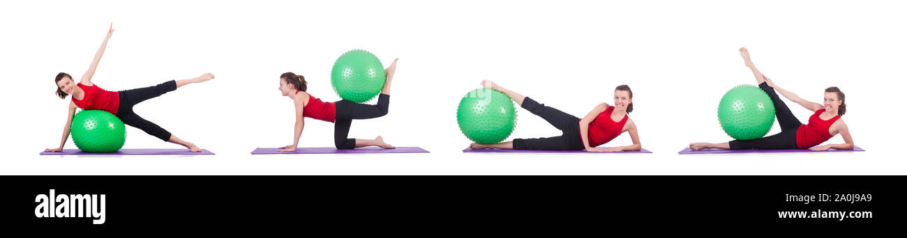The young woman exercising with swiss ball Stock Photo - Alamy