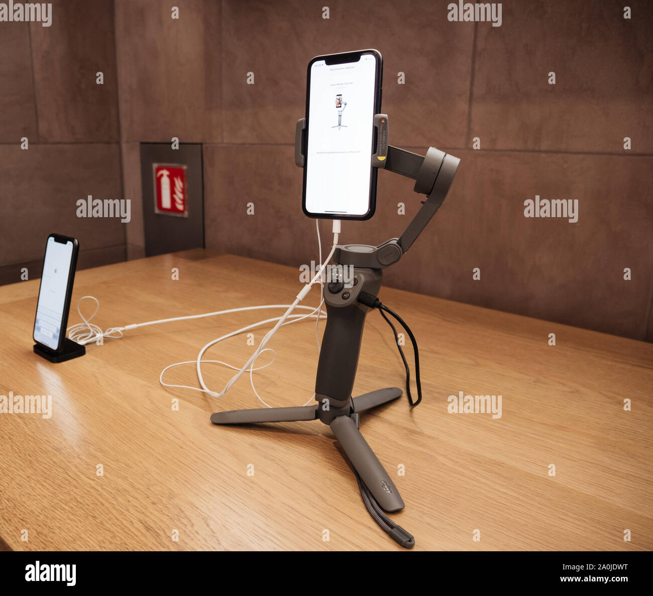 Paris, France - Sep 20, 2019: New DJI Osmo 3 gimbal with the new iPhone 11,  11 Pro and Pro Max are displayed in Apple Store Stock Photo - Alamy