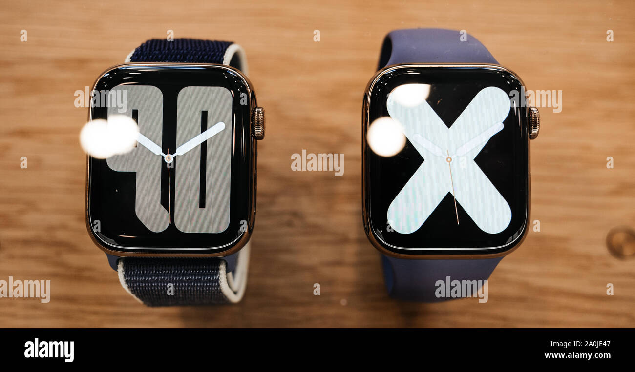 Paris, France - Sep 20, 2019: Modern numerals watch faces on new wearable  Apple Watch Series 5