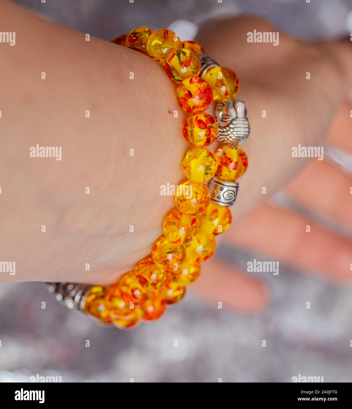 Wearing bracelet on wrist hires stock photography and images Alamy