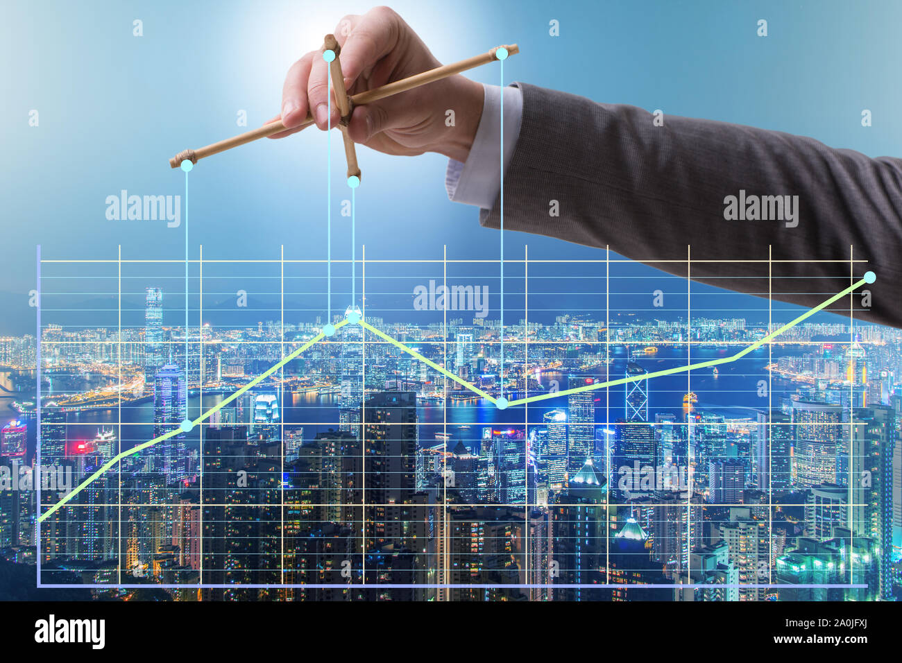 The businessman controlling the market with strings Stock Photo - Alamy