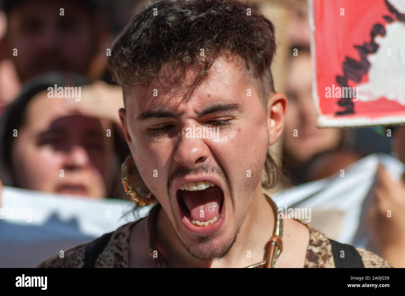 Glasgow, Scotland, UK. 20th September, 2019. A protester marching through the streets of Glasgow from Kelvingrove Park to George Square during the Global Climate Strike demonstration to demand action on the world's climate crisis. Credit: Skully/Alamy Live News Stock Photo