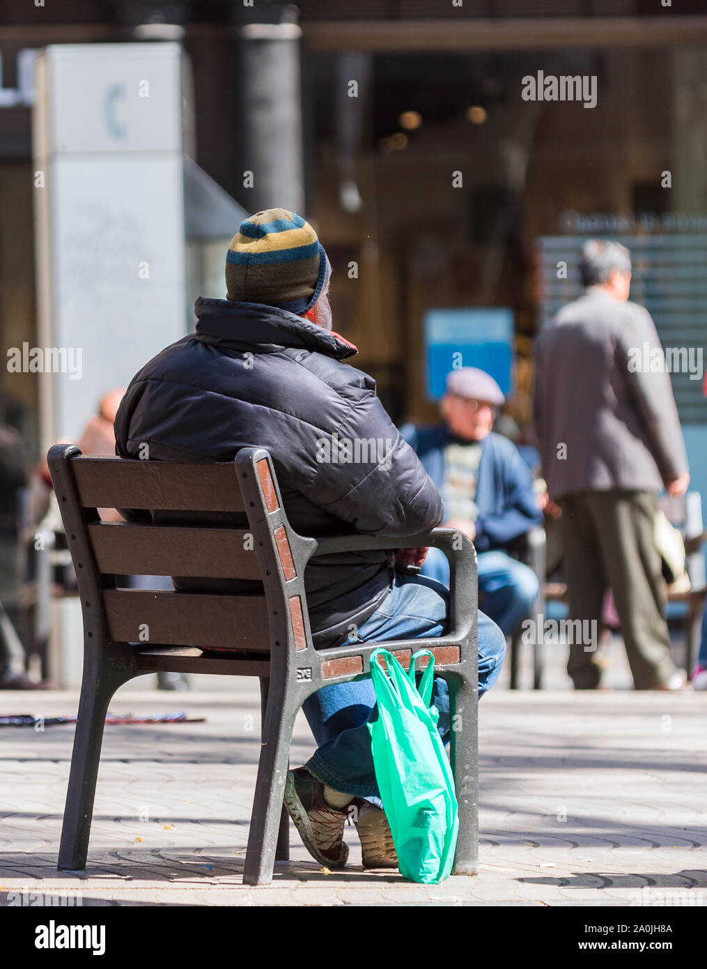 Old man sitting on chair hi-res stock photography and images - Alamy