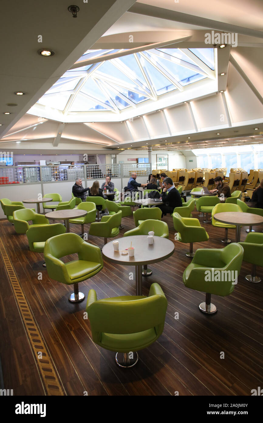 Buenos Aires, Argentina - September 15, 2019: Unidentified people drinking and eating in the lobby of the Buquebus boat sailing from Buenos Aires to M Stock Photo