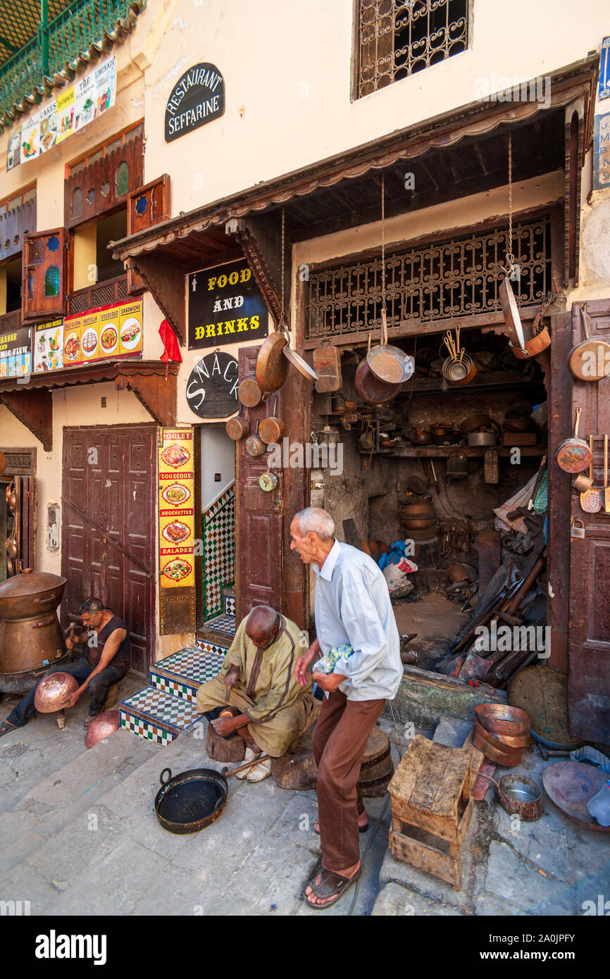 Copper Beaters Souk at Place Seffarine Fez,Morocco medina ,an array of arts,crafts all things Moroccon,Copper,Metal, pottery, Shops,Souk,Medina Stock Photo