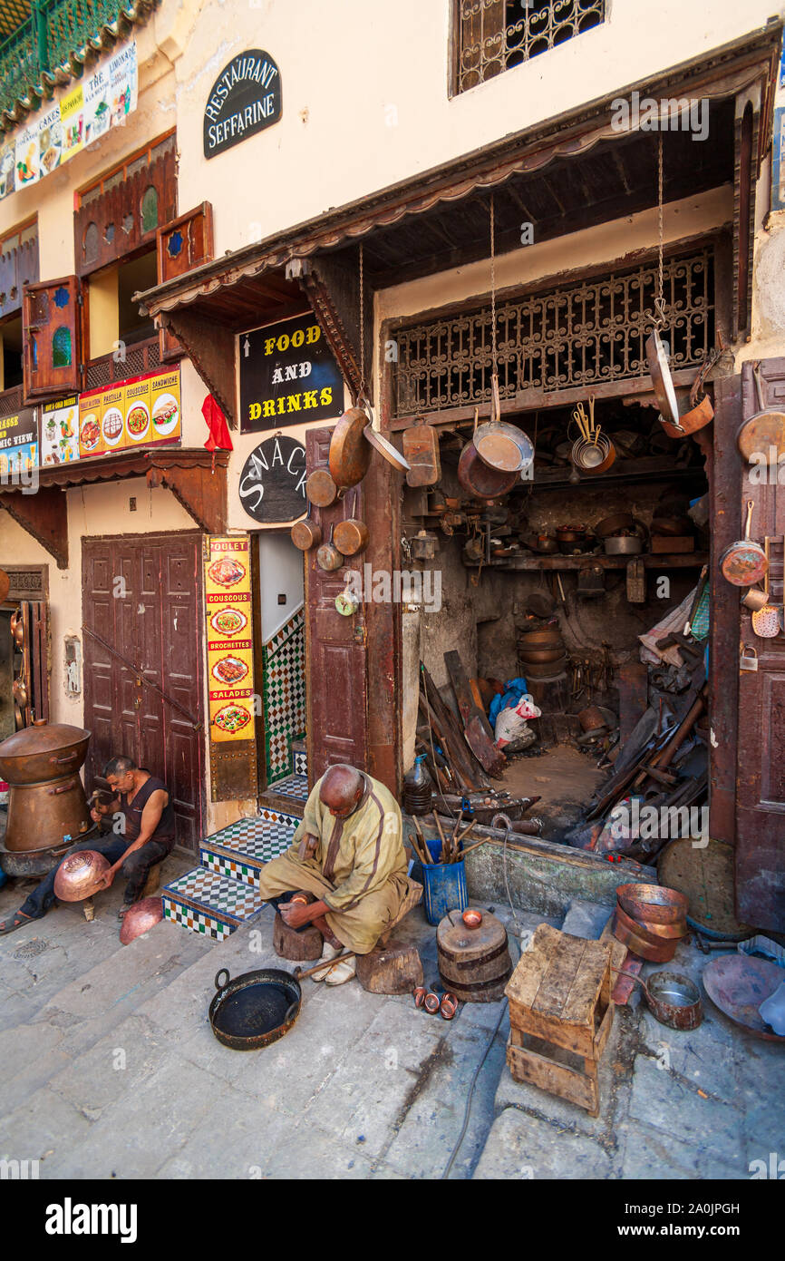 Copper Beaters Souk at Place Seffarine Fez,Morocco medina ,an array of arts,crafts all things Moroccon,Copper,Metal, pottery, Shops,Souk,Medina Stock Photo