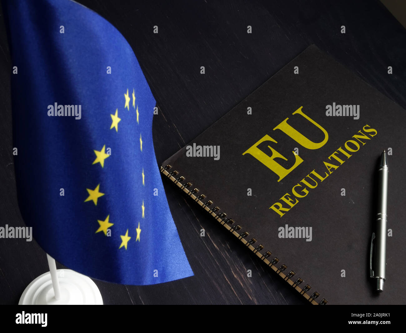 EU regulations and Europe Union flag. Stock Photo