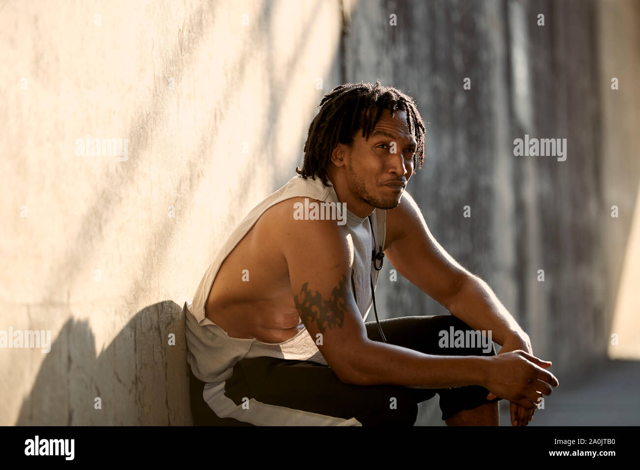 African-American man resting after workout Stock Photo