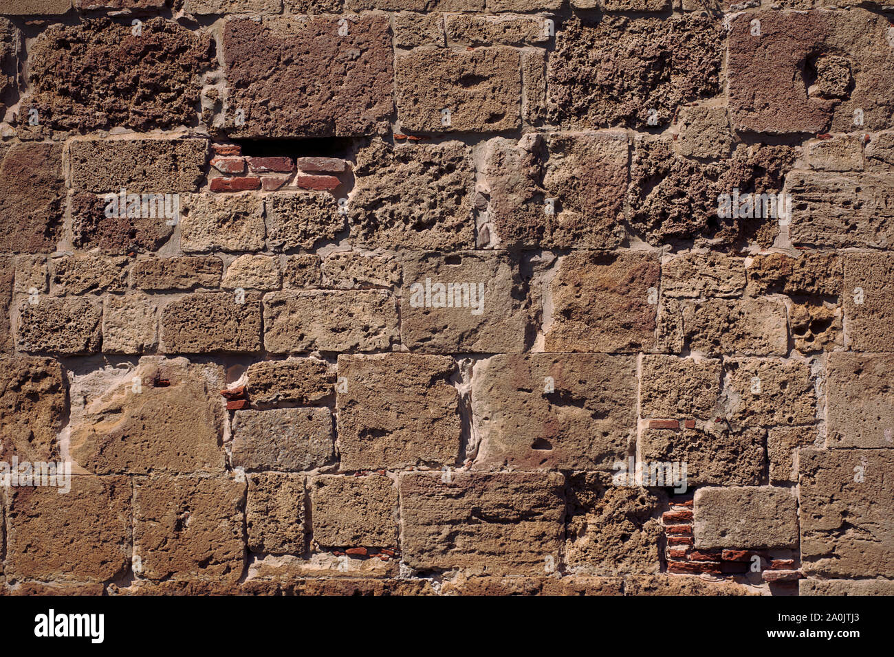 Old medieval brick wall surface. Brick wall texture. Antique wall