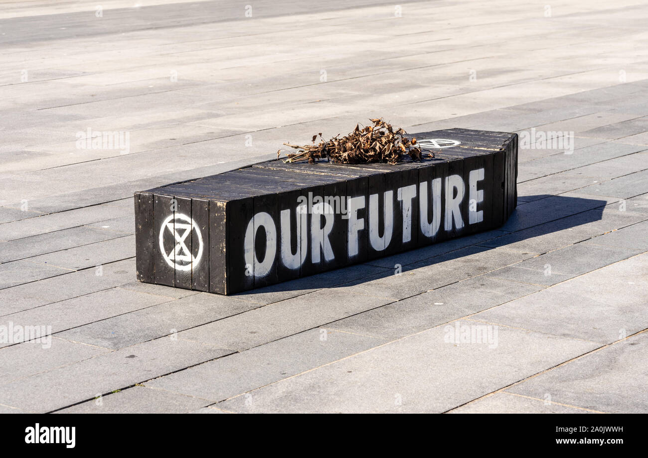 Southampton, UK. 20/09/2019: A black coffin with 'Our Future' written on it and wilted flowers put on top by the Extinction Rebellion Group symbolising a bleak future as we are facing a warming planet as a result of the current climate crisis. Climate strike protest in Southampton, England, UK Stock Photo