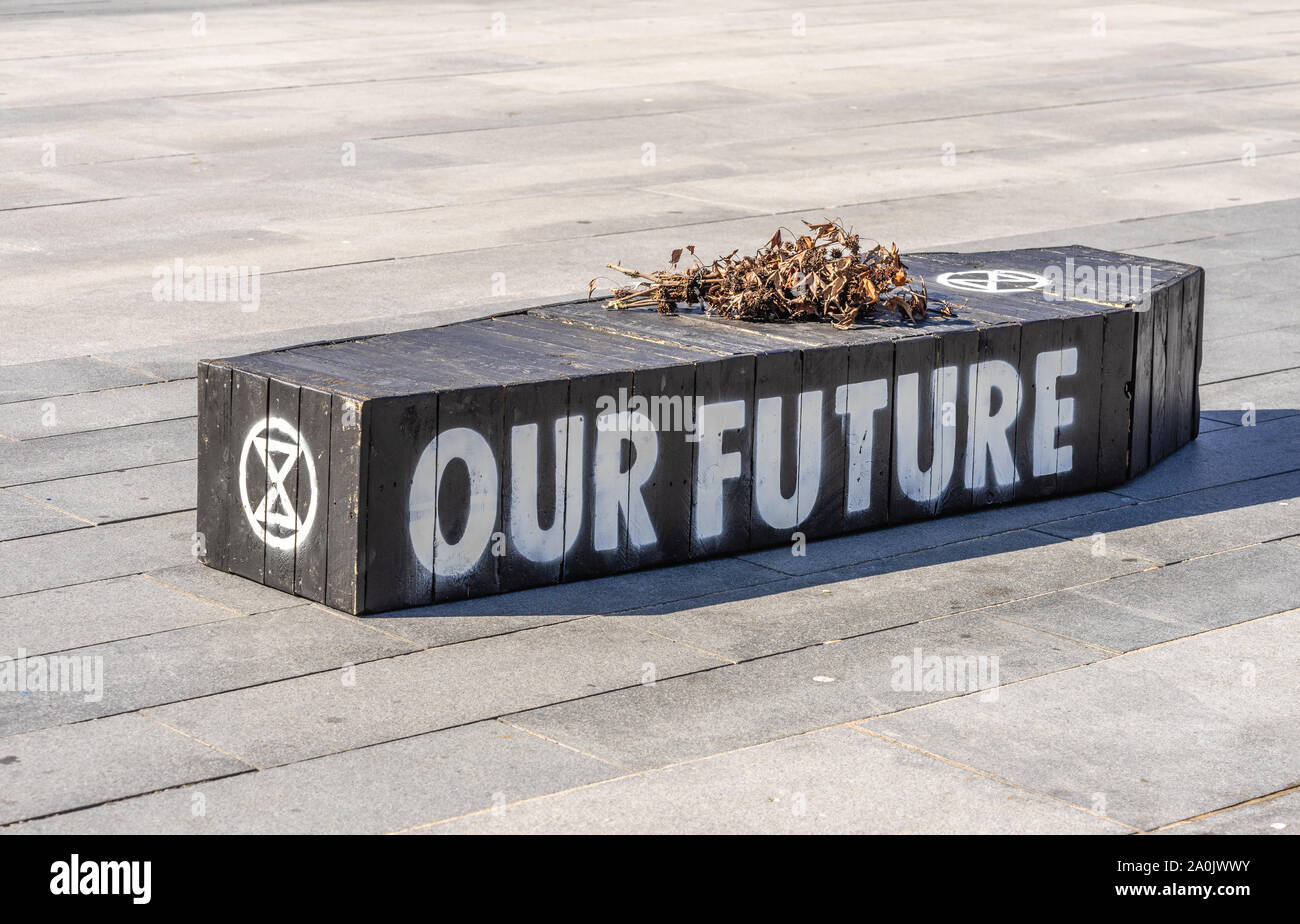 Southampton, UK. 20/09/2019: A black coffin with 'Our Future' written on it and wilted flowers put on top by the Extinction Rebellion Group symbolising a bleak future as we are facing a dying planet as a result of the current climate crisis. Climate strike protest in Southampton, England, UK Stock Photo