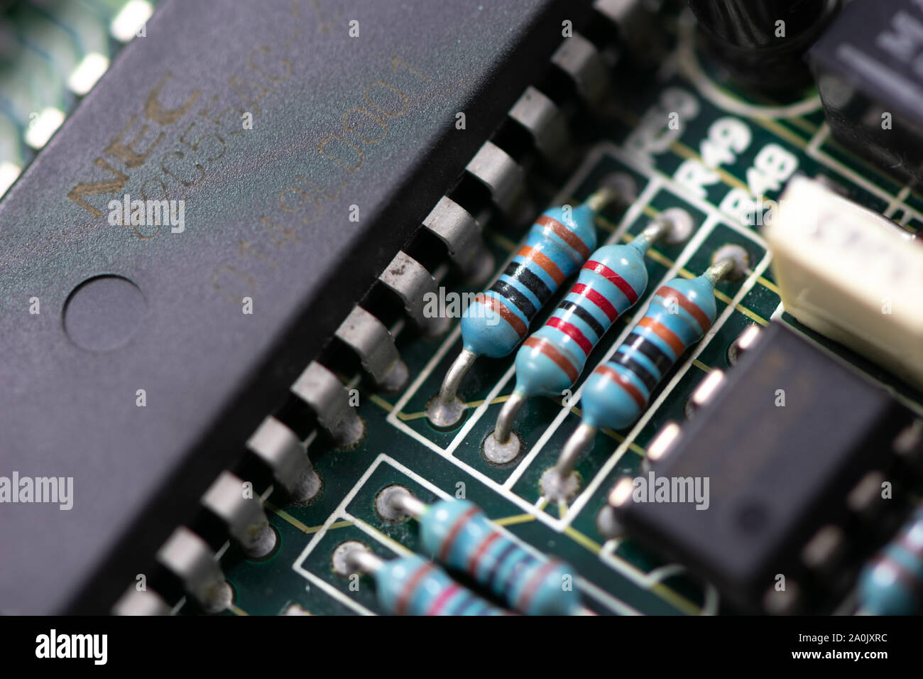 Close up shot of PCB unit with visible resistors, capacitors and micro