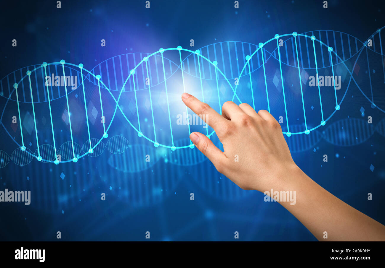 Female hand touching DNA molecule with blue background Stock Photo - Alamy