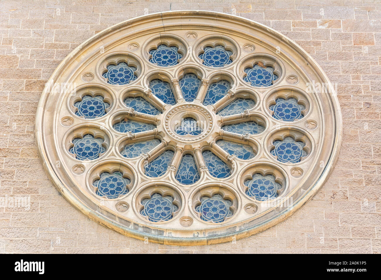 Adelaide, Australia - March 16, 2017. Exterior of rose window of St Peter’s Cathedral in Adelaide. Stock Photo
