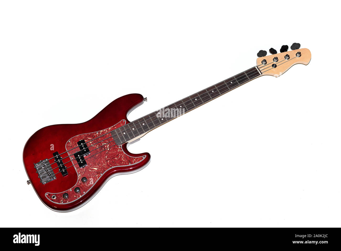 Fourstringed bass guitar in cherrycolored wood against a black
