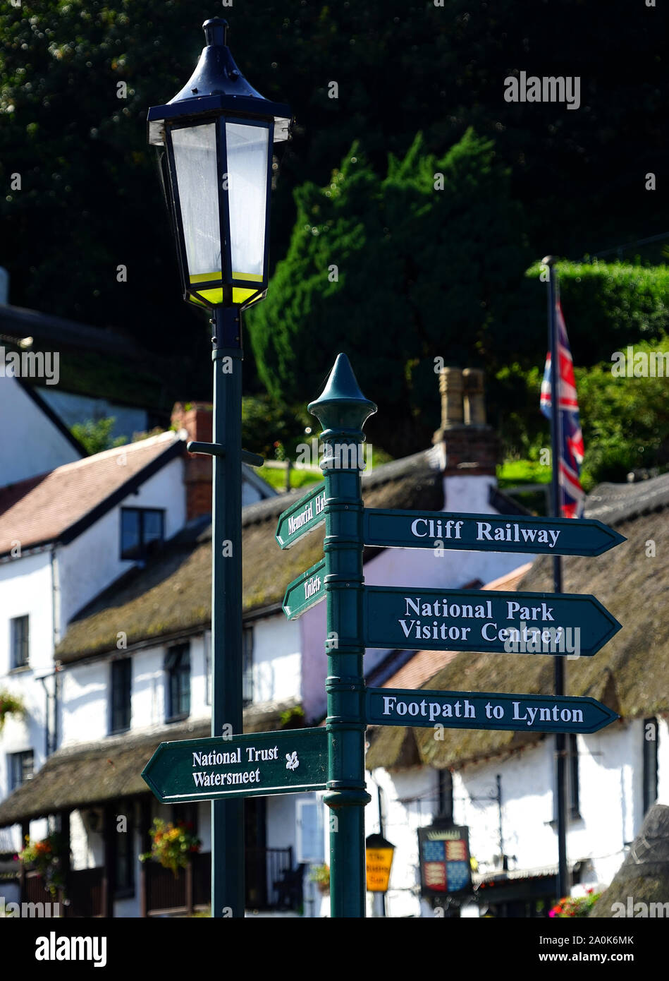 Signpost and street lamp at Lynmouth, Devon Stock Photo - Alamy