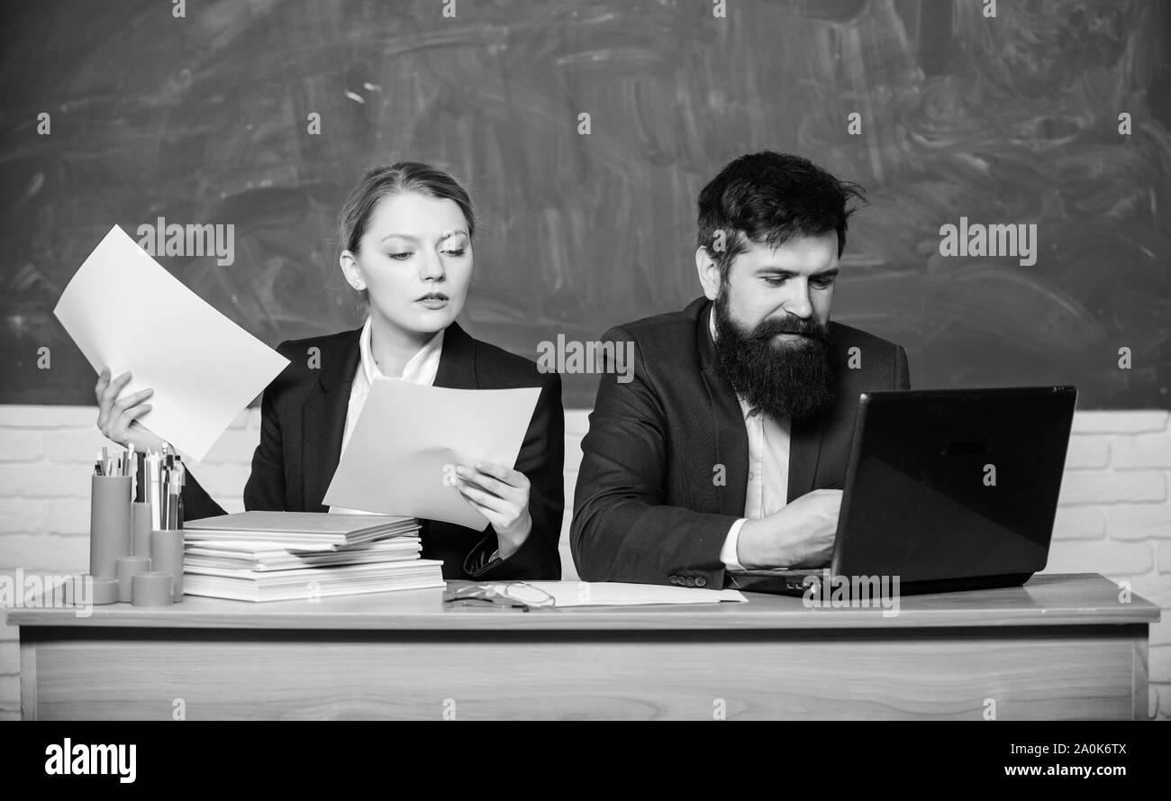 Documenting the result. business couple use laptop document