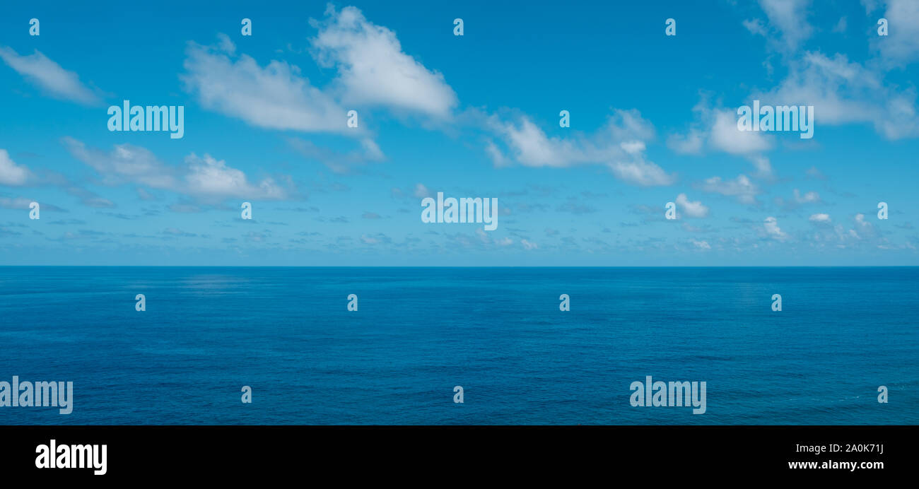 blue sky with clouds over water - ocean horizon , sea background Stock Photo