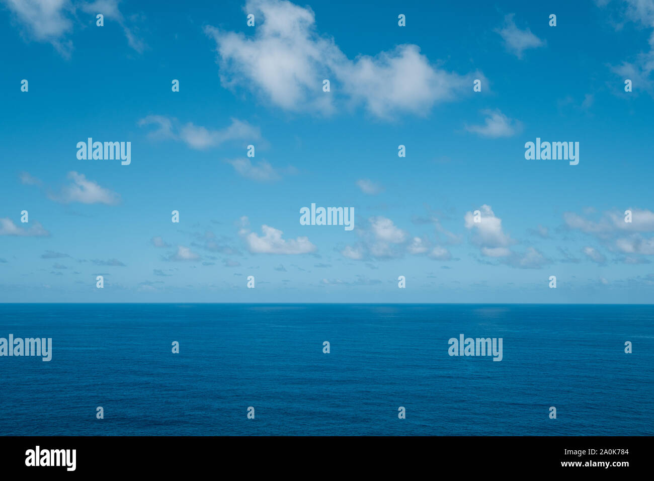 blue sky with clouds over water - ocean horizon , sea background Stock Photo