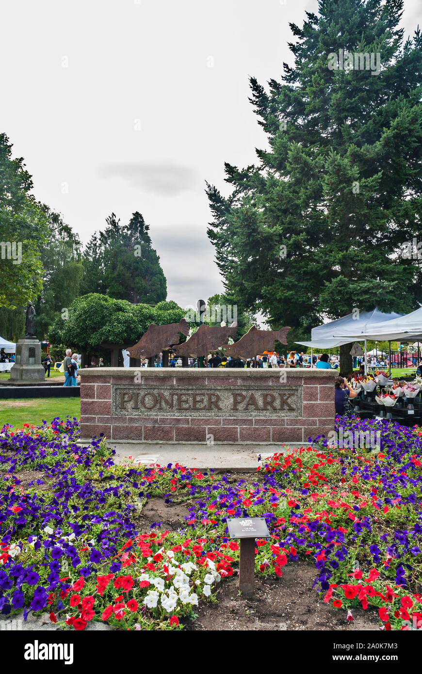 Stone Pioneer Park marquee with fish sculptures in Puyallup, Washington