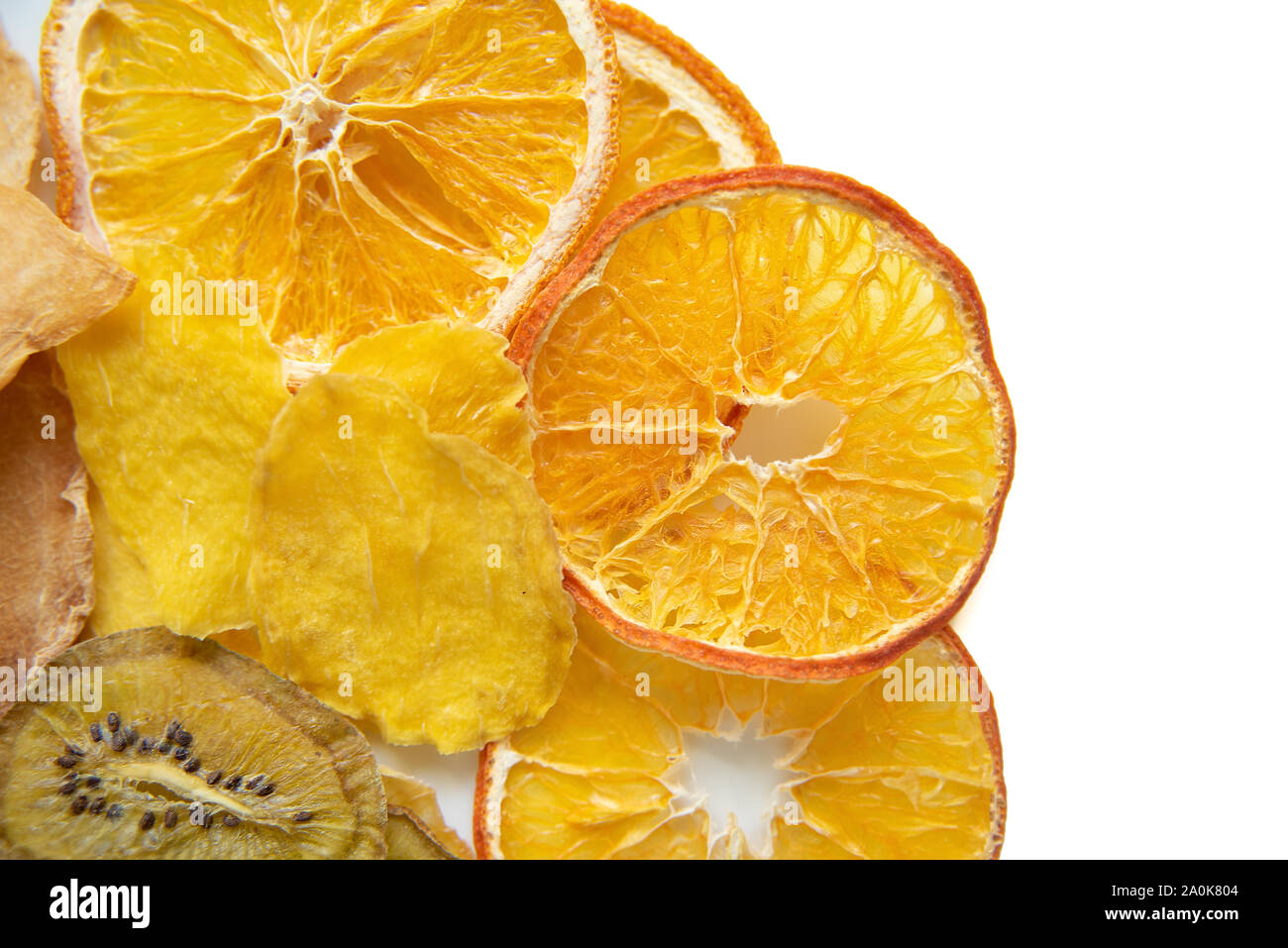 pile of dried tropical fruits isolated on white background. Mix of