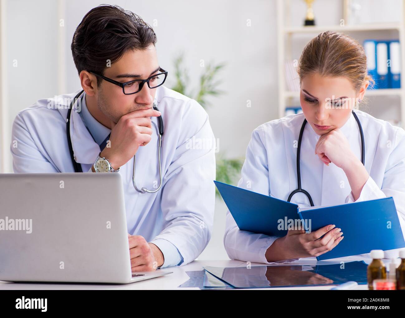 The male and female doctor having discussion in hospital Stock Photo ...