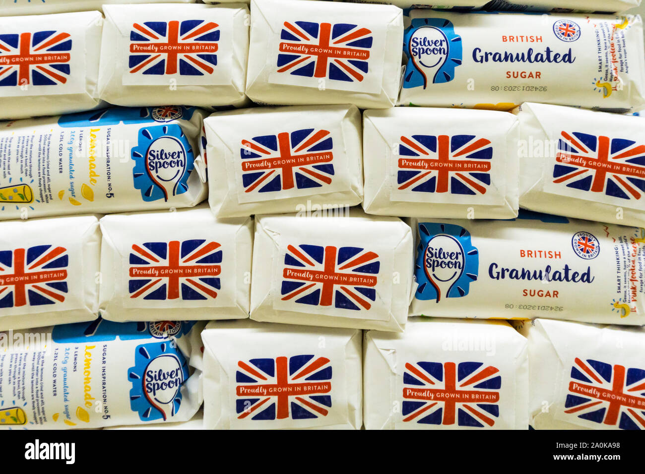 Bags of British granulated Sugar with a Union Jack sign & the words Proudly Grown in Britain. Stock Photo