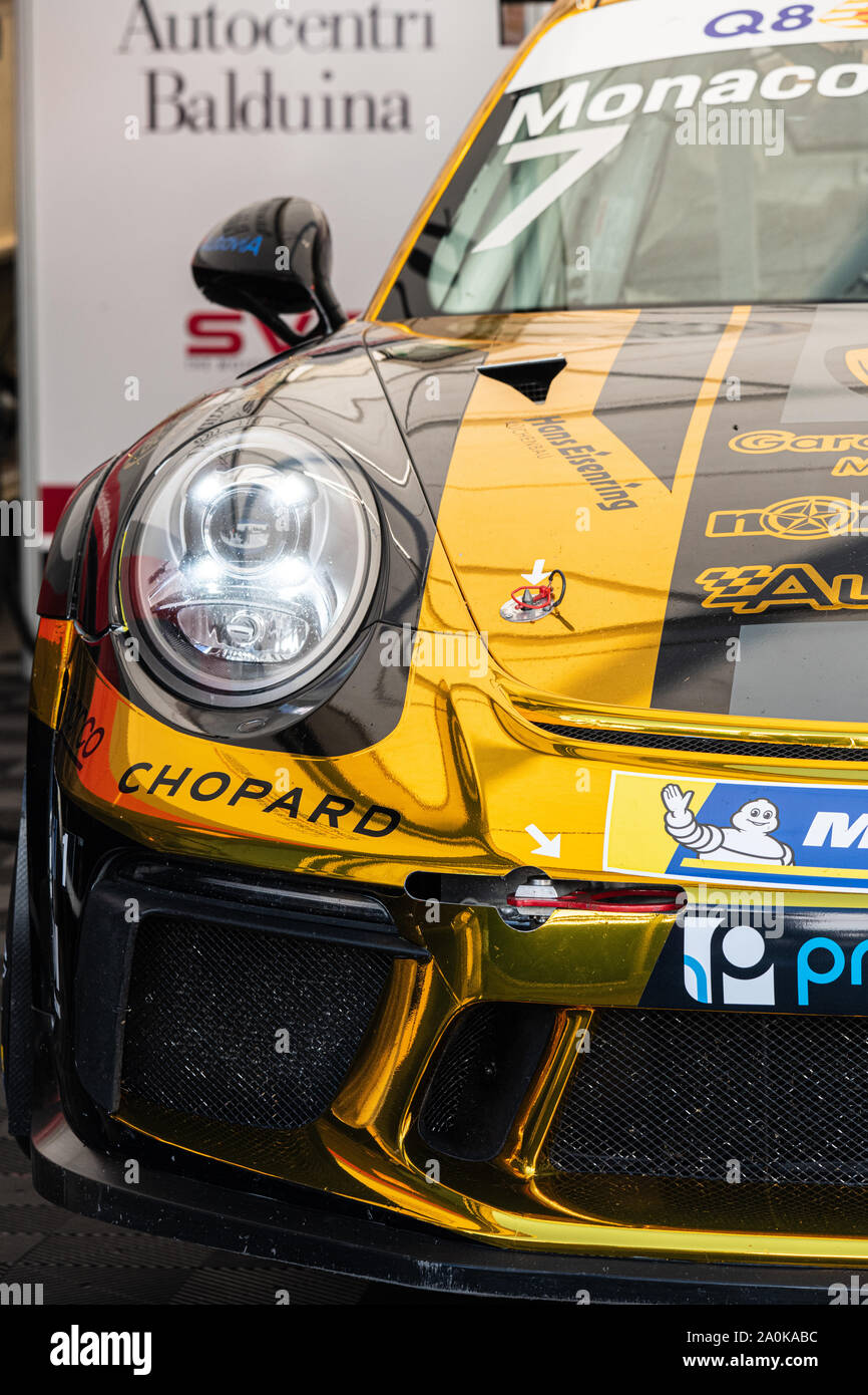 Vallelunga, Italy september 14 2019, Racing Porsche Carrera car golden color front view in paddock close up no people Stock Photo
