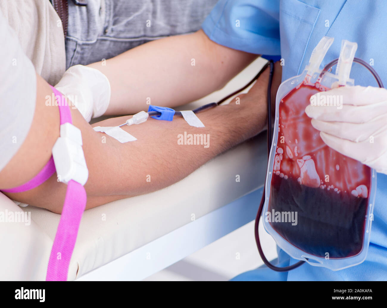 The patient getting blood transfusion in hospital clinic Stock Photo