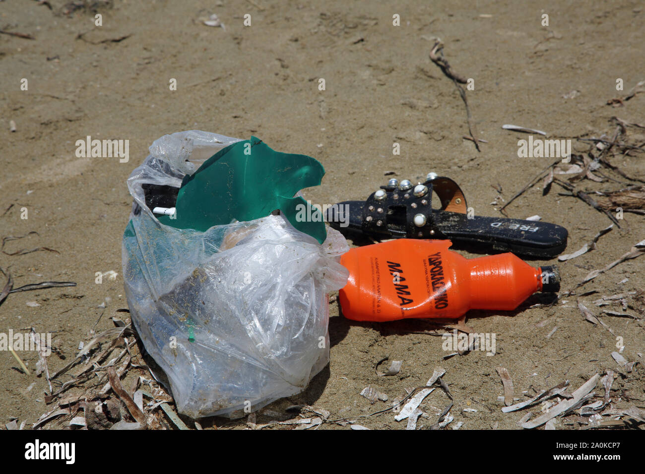 Vouliagmeni Attica Greece Vouliagmeni Beach Plastic washed up on Beach Stock Photo